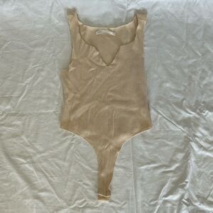 Ribbed v cut body suit